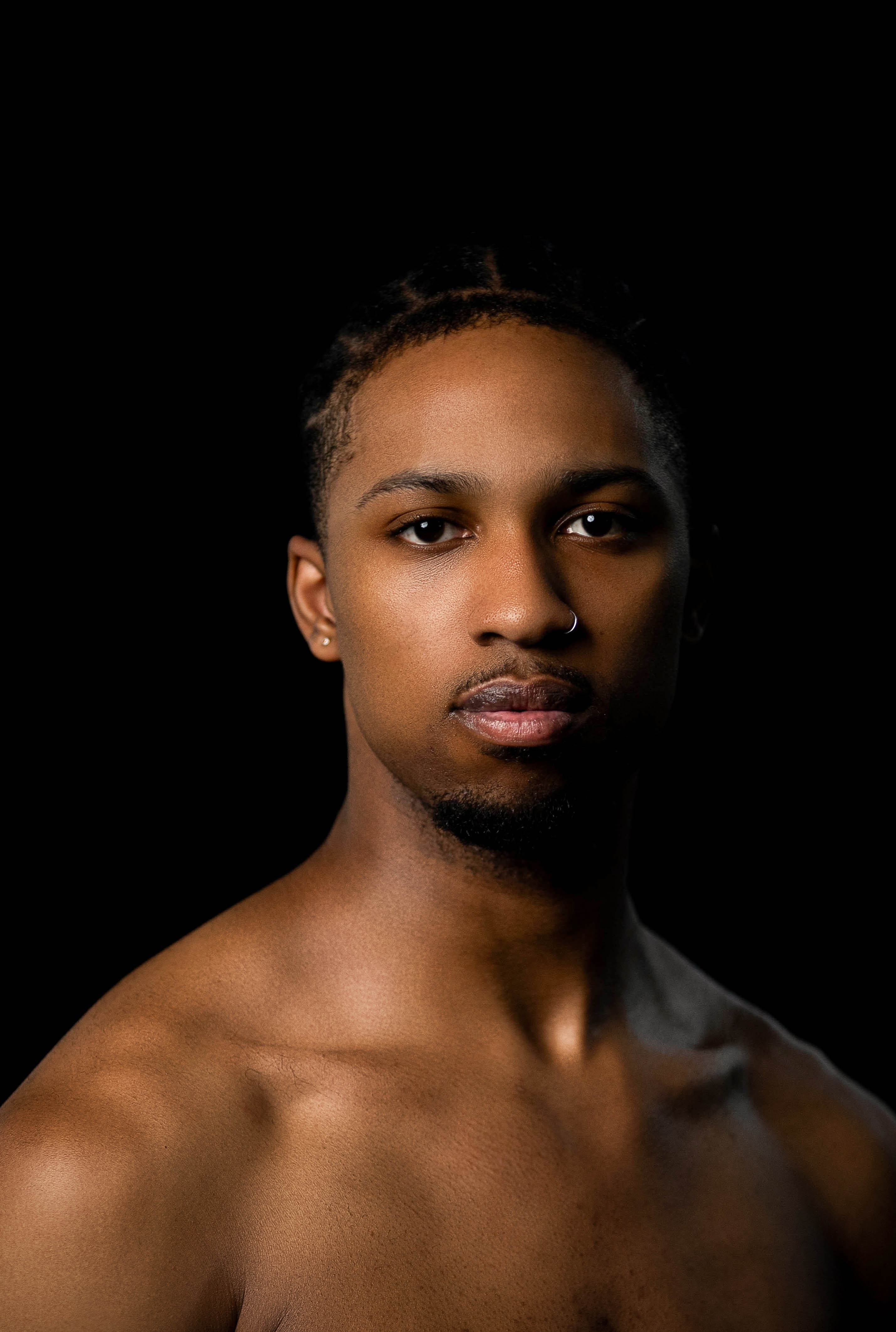 portrait of dancer shoulders up looking directly at camera