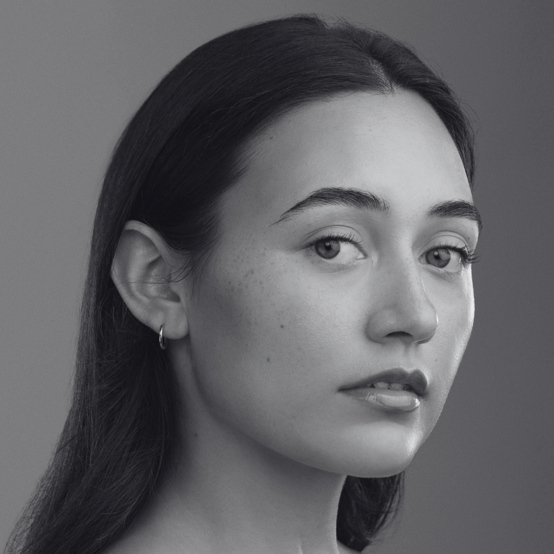 Black and white photo of close up headshot of woman