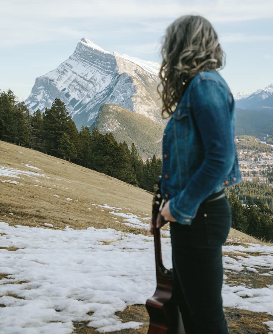 Ellen Braun looking at Rundle Mountain