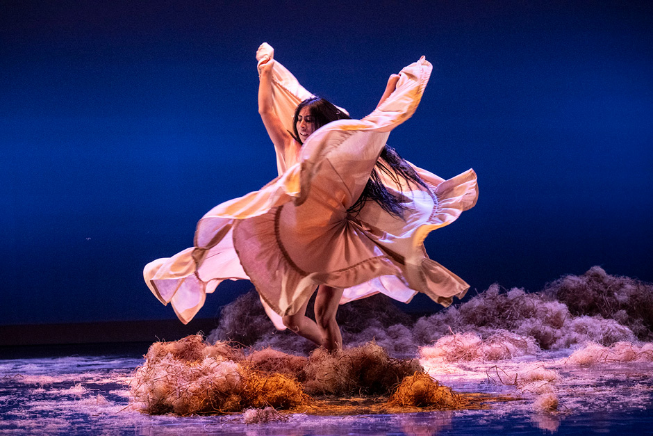 A dancer performs on stage