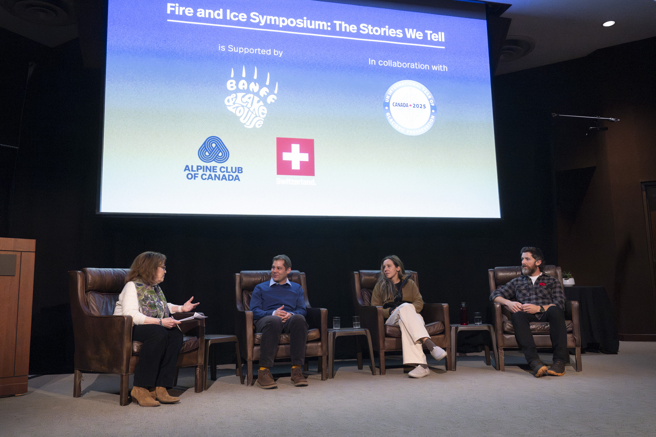 Fire and Ice Symposium Panelists having a discussion on the stage.
