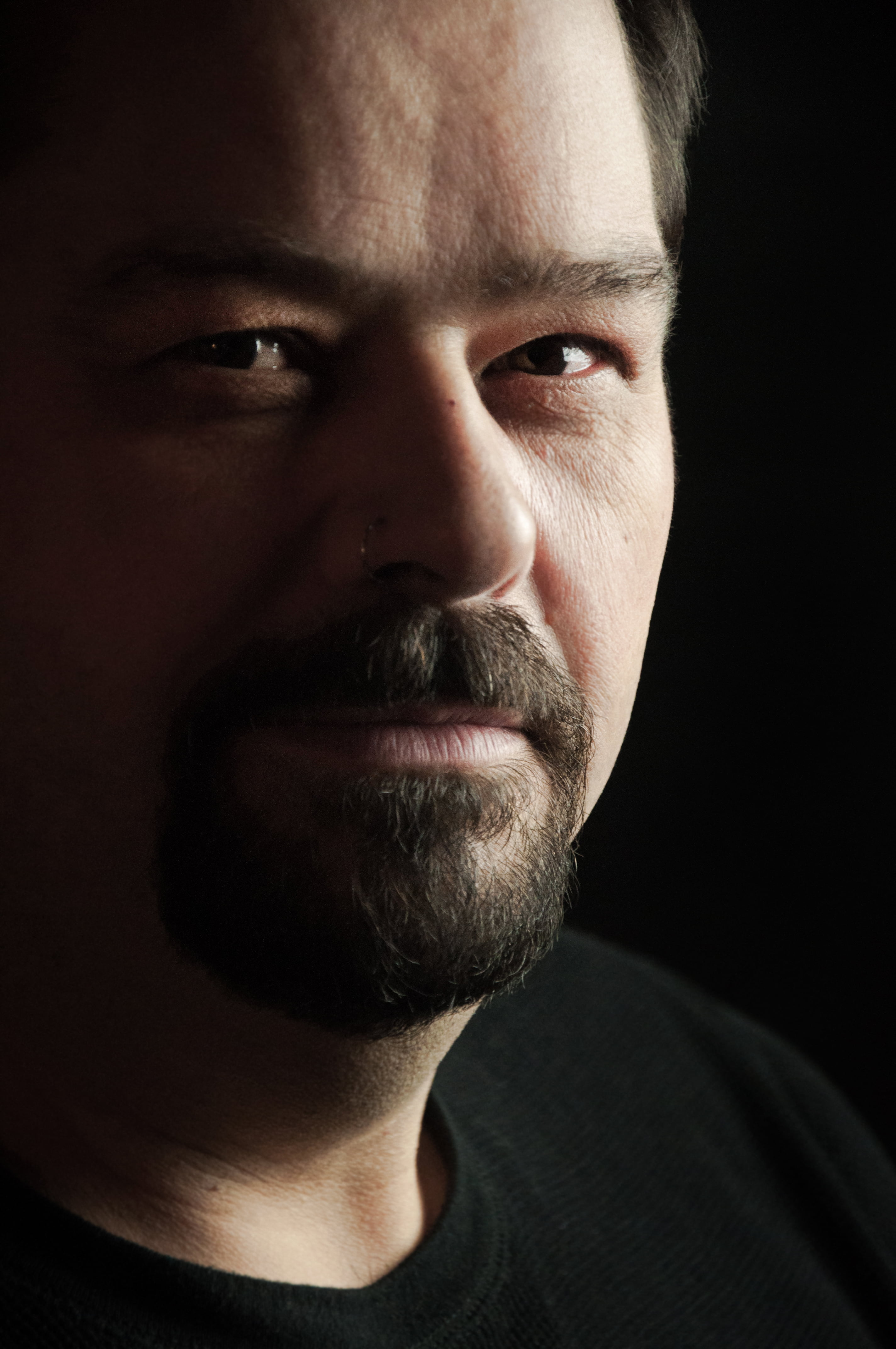 Men with mustache in a black t-shirt
