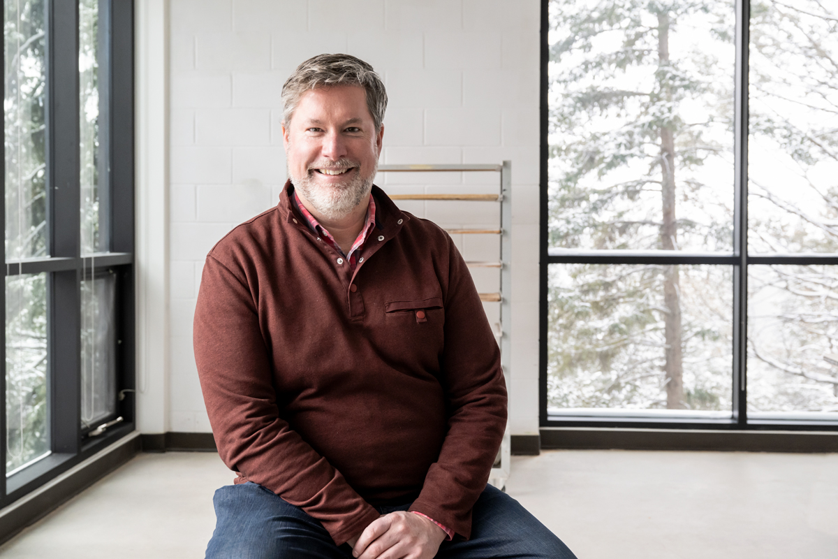 Chris Lorway inside a visual arts studio in Glyde Hall. 