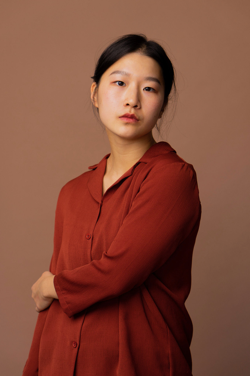Asian women in red loose shirt