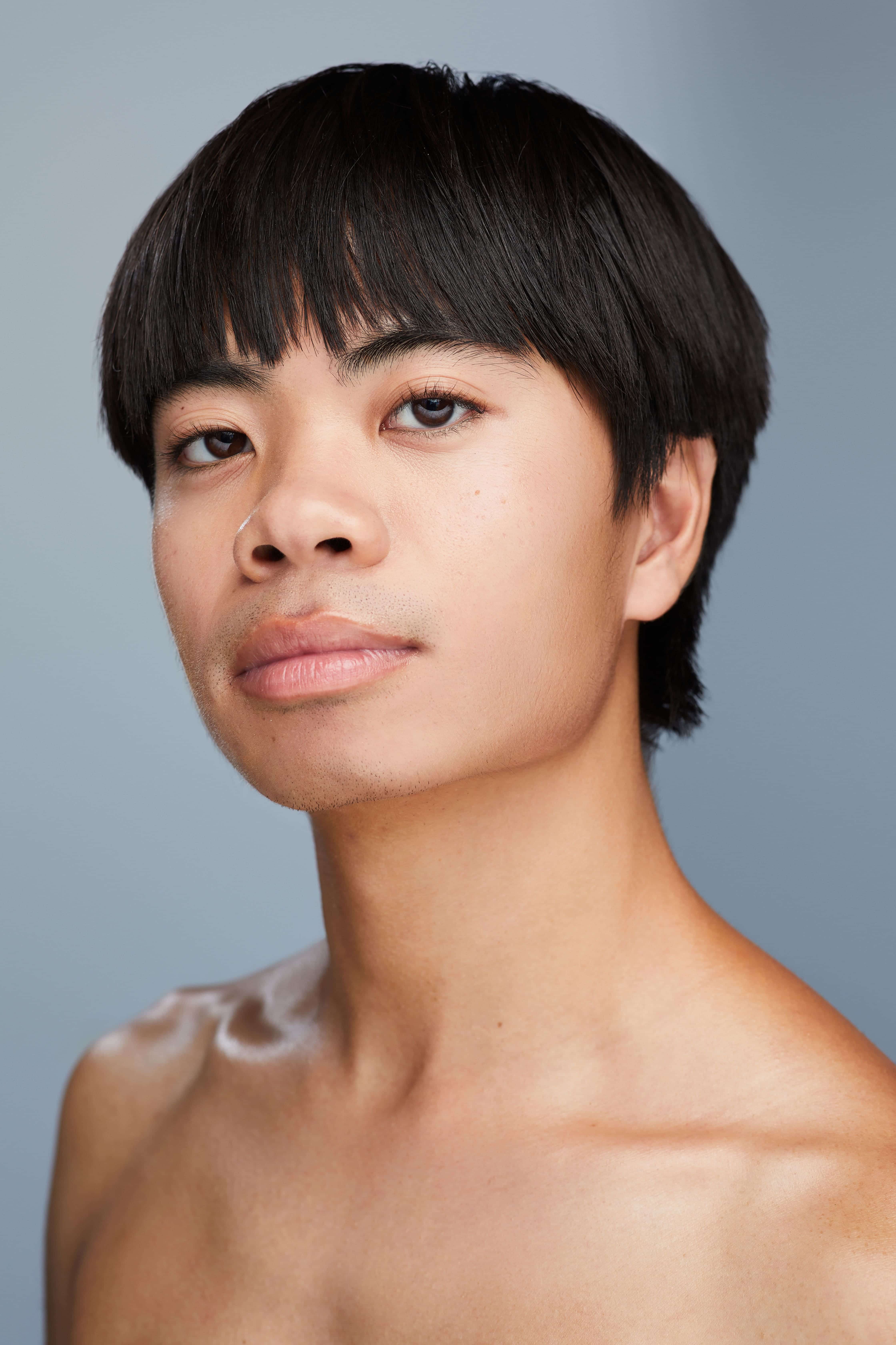 Asian Male dancer with black short hair