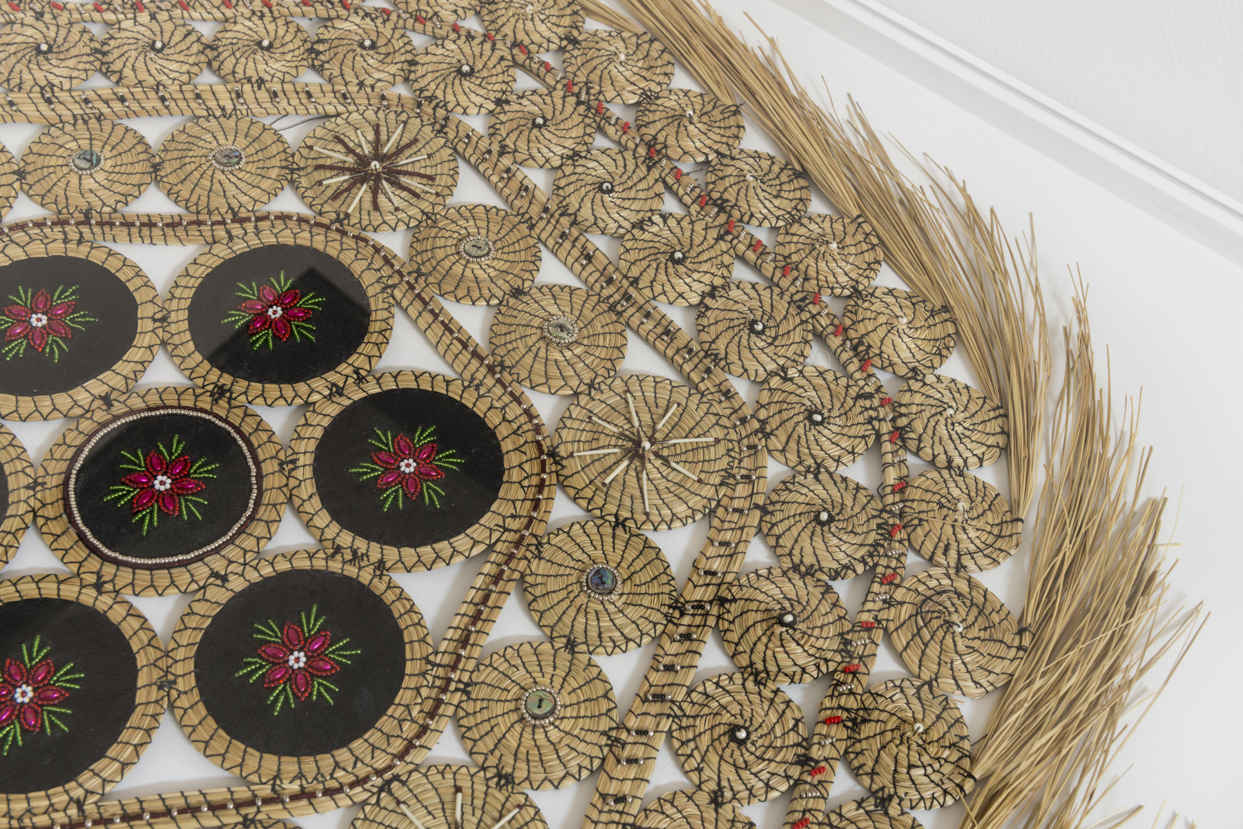 Rebecca Baird, Detail of "MEMORY CLAIM #1" (1995). Sweet grass, hide, porcupine quills, seed beads and abalone buttons, 