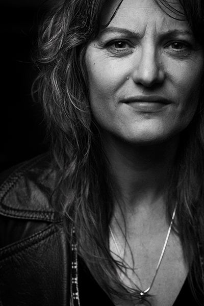 Black and White headshot of Kenna Burima