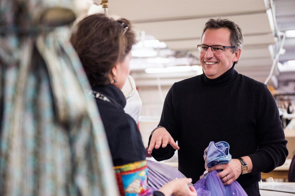 Jean Grand-Maître discusses costumes with designer. 