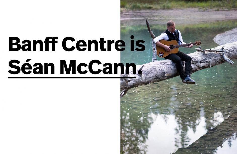 Banff Centre Is Sean McCann Musician Sean McCann sitting in nature tuning his guitar.