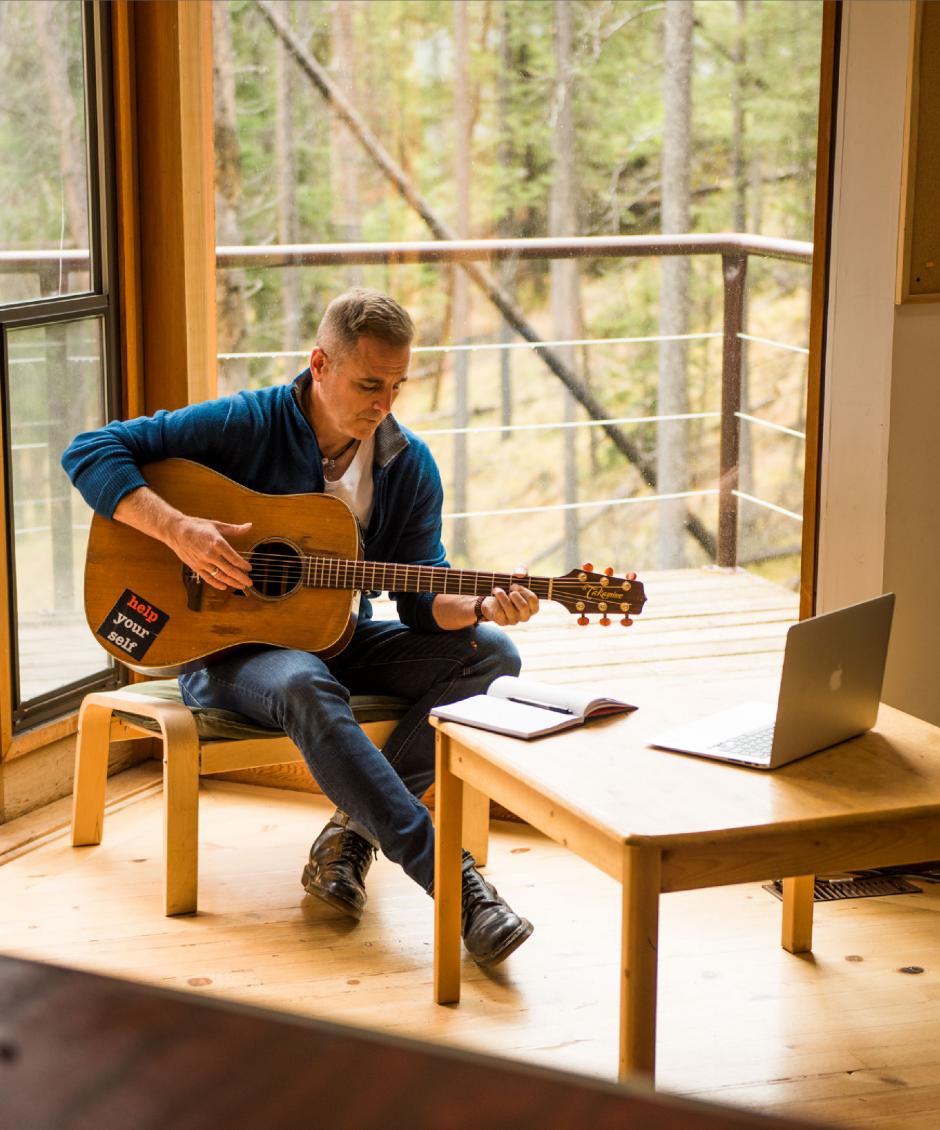 Sean McCann Writing Music | Banff Centre Sean McCann writing music in a studio.