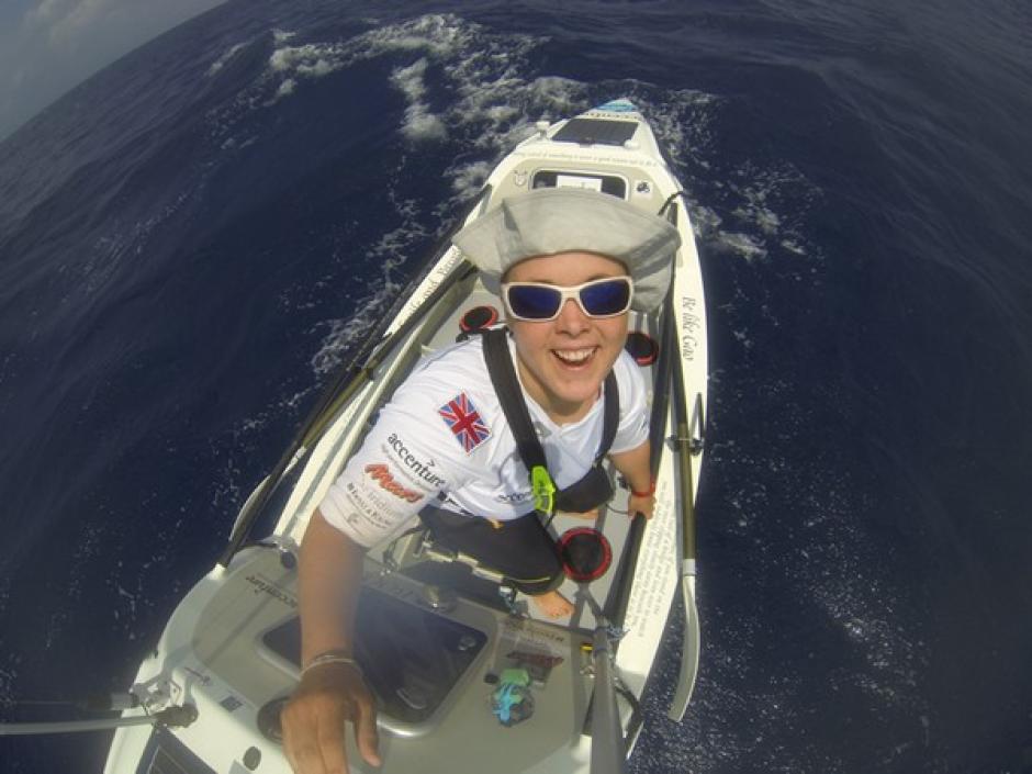 Image of Sarah Outen rowing in the Pacific ocean