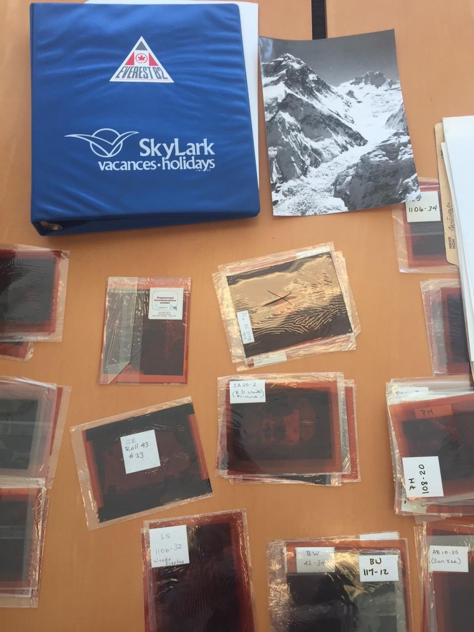 A picture of photograph negatives and other archival material from the Everest 1982 collection.