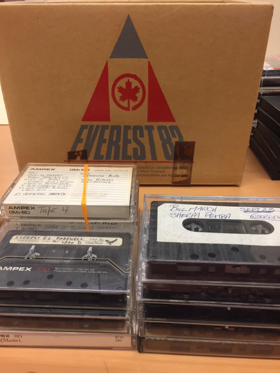 Images of audio cassette tapes in front of box with "Everest 82" logo