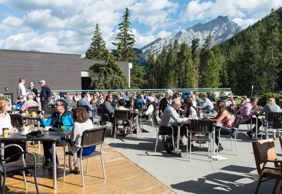 People gather on the rooftop to enjoy the sun. 