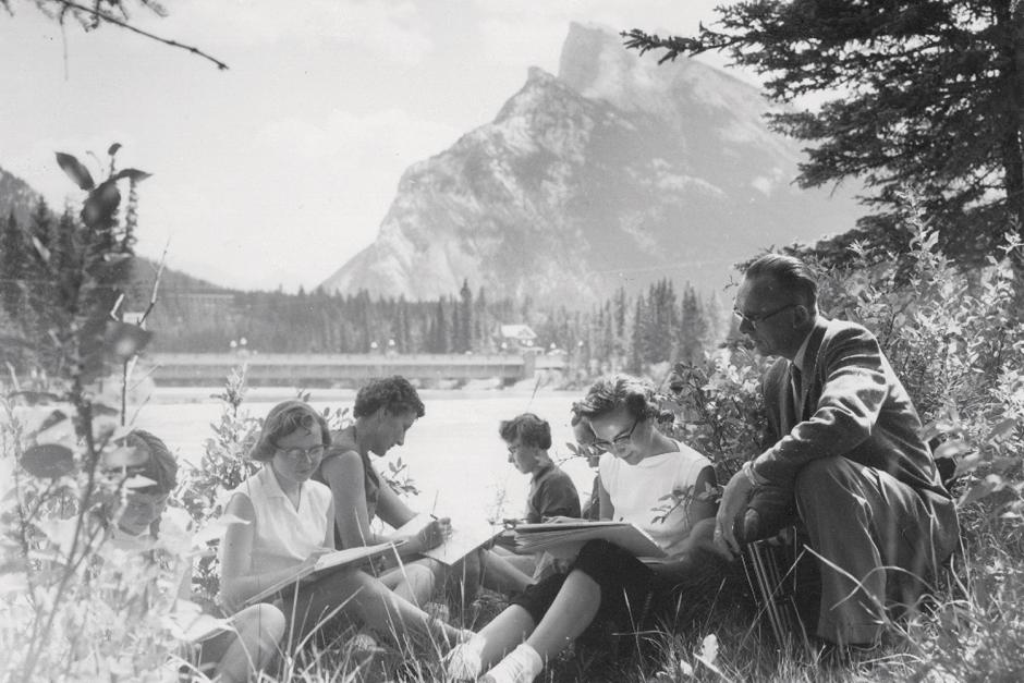 Art students painting by the Bow River with faculty Murray MacDonald in 1956