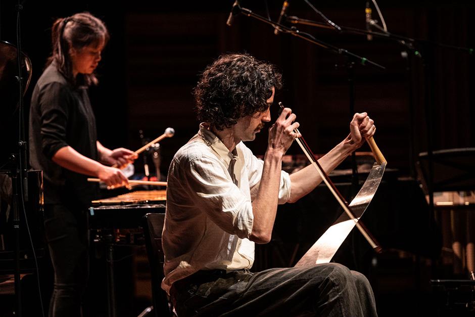 Hoi Tong Keung, percussion; Ollie Hawker, musical saw. Photo by Rita Taylor, Banff Centre 2022. 