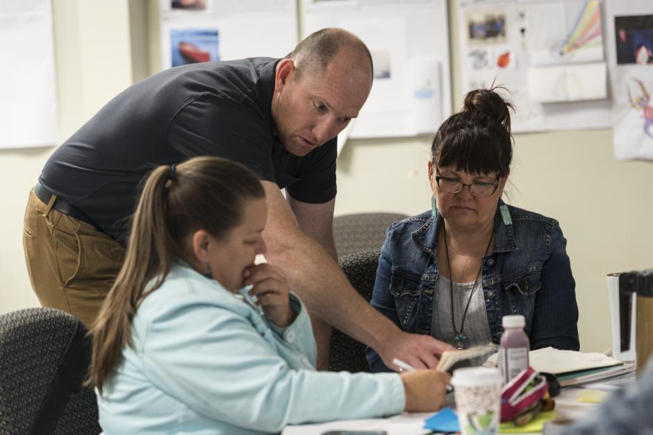 Faculty member Dan McCarthy works with 2016 participants.