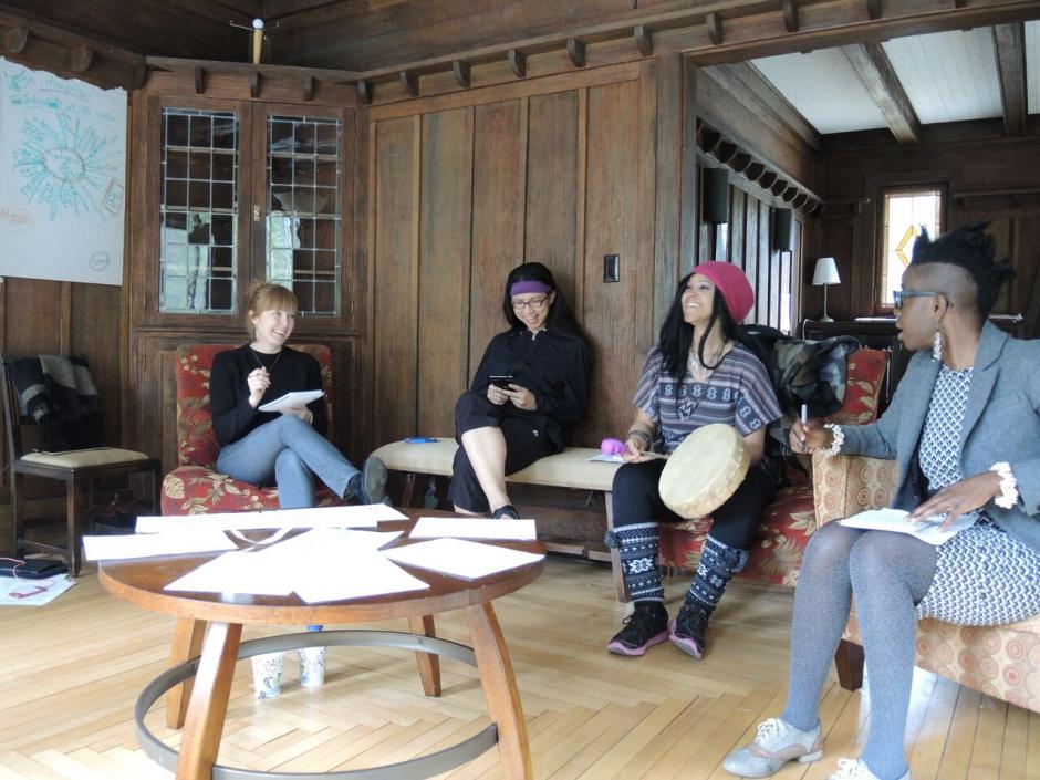 Liz Forsberg, Gein Wong, Mahlikah Aweri, and d'bi young plan a project in the Painter House at The Banff Centre