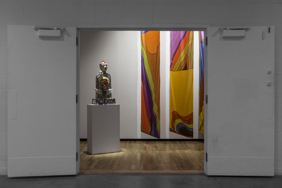 Installation view of Takao Tanabe, ``Untitled *3 Nylon Banners*`` (1978) and John de Fazio, ``PMS Tombstone`` (1996). Walter Phillips Gallery, Banff Centre. Photo by Meghan Krauss.