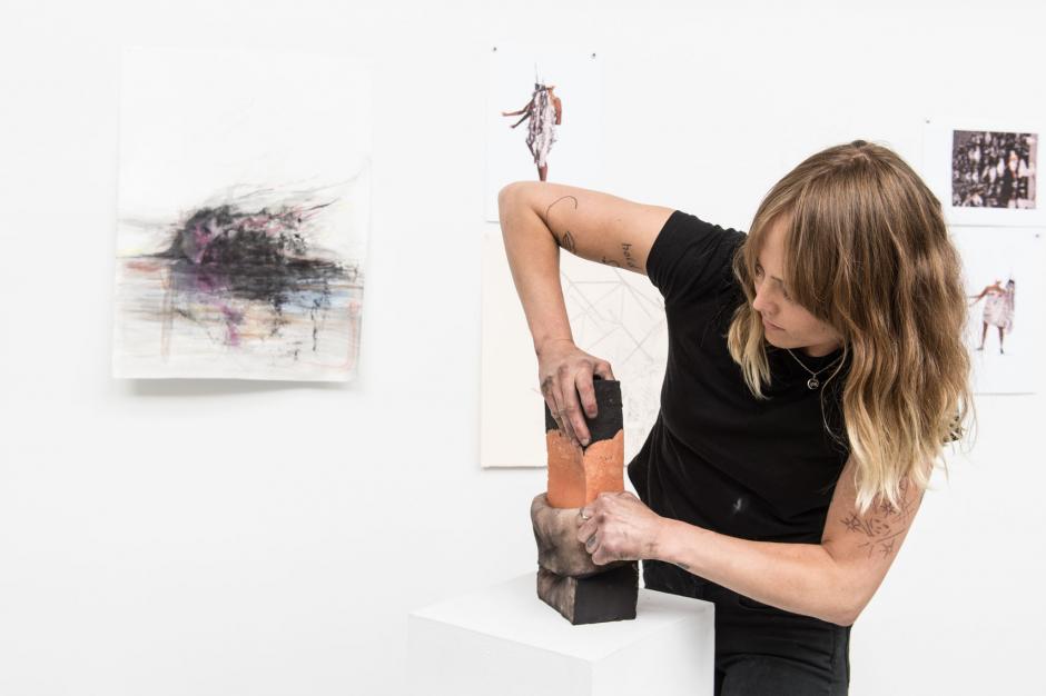 Auður Ómarsdóttir working with clay in the studio