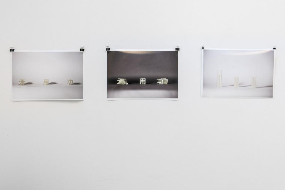 Three photographs exhibited on the wall of Rebecca's studio
