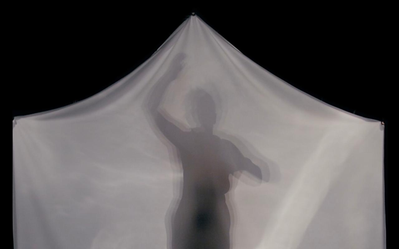 Figure in a tent