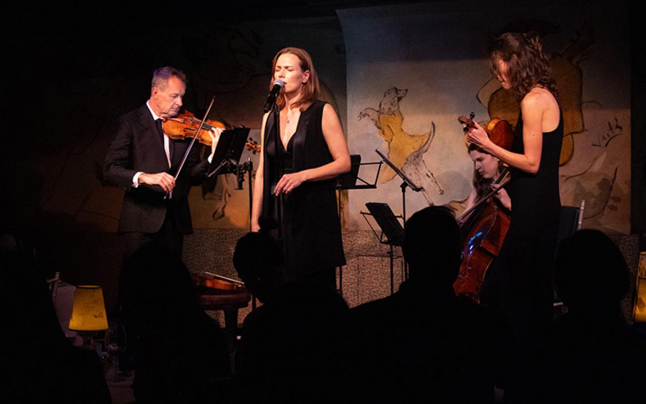 Members of Australian Chamber Orchestra performing on a a stage