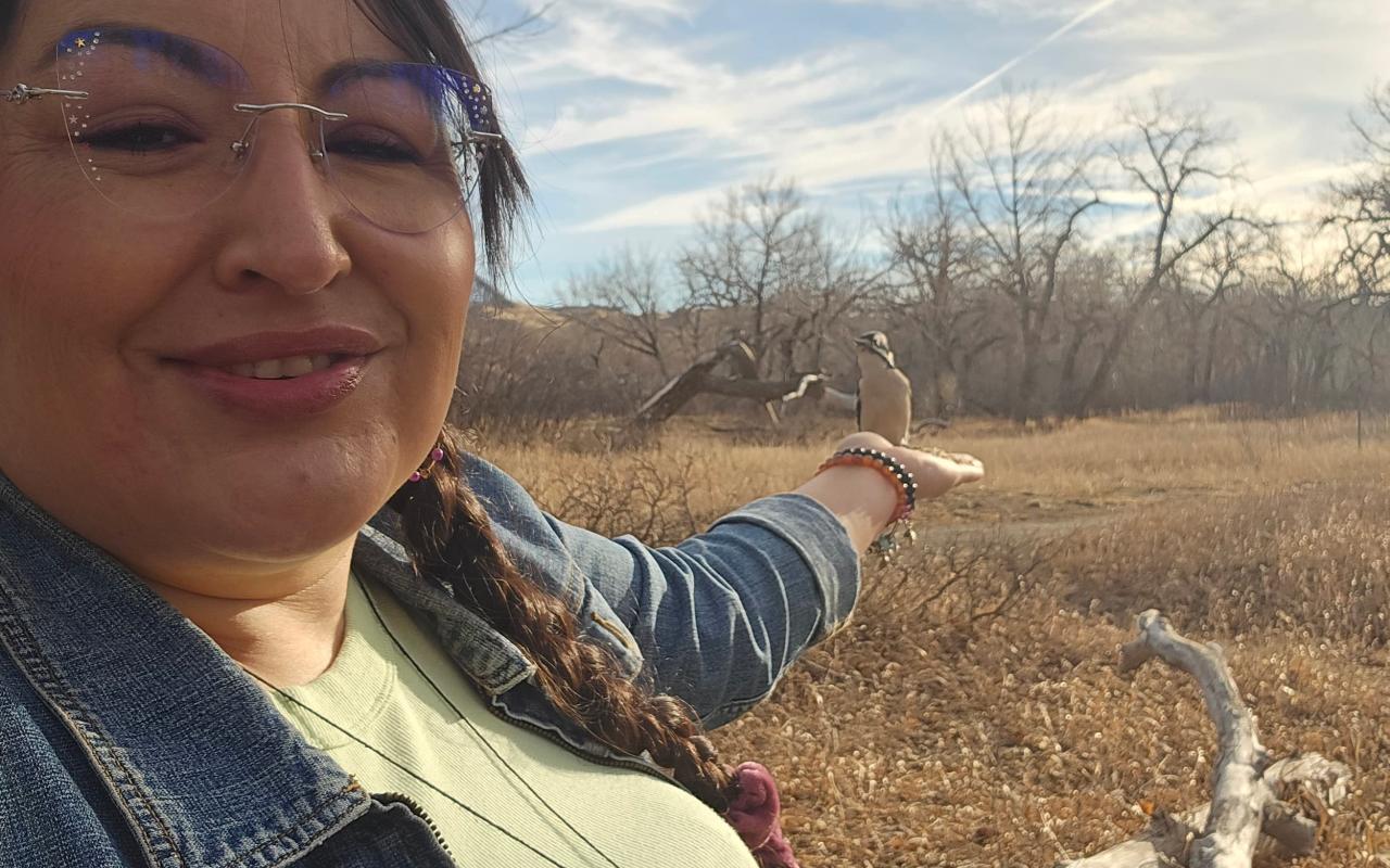 Photo of Indigenous woman out on the land