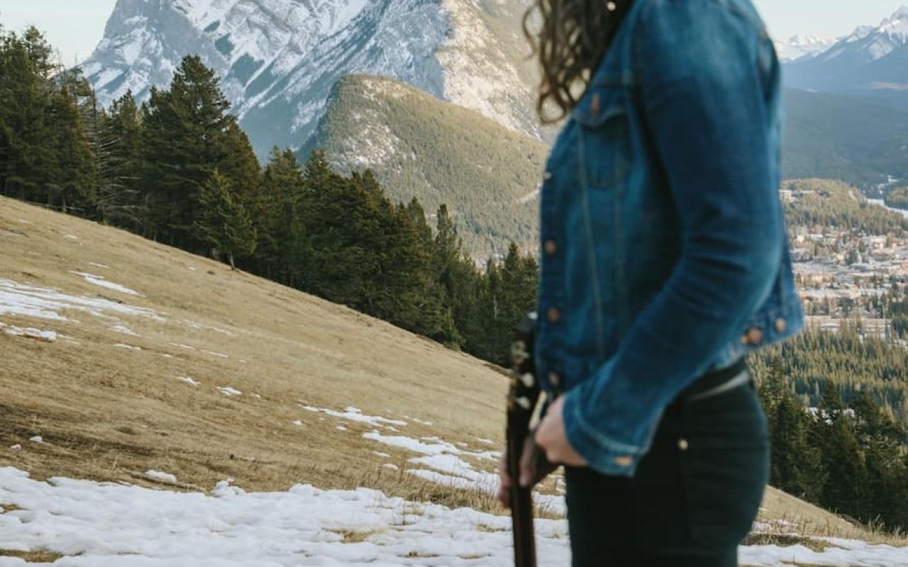 Ellen Braun looking at Rundle Mountain