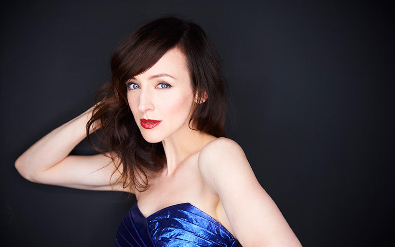 Sarah Slean in a blue gown