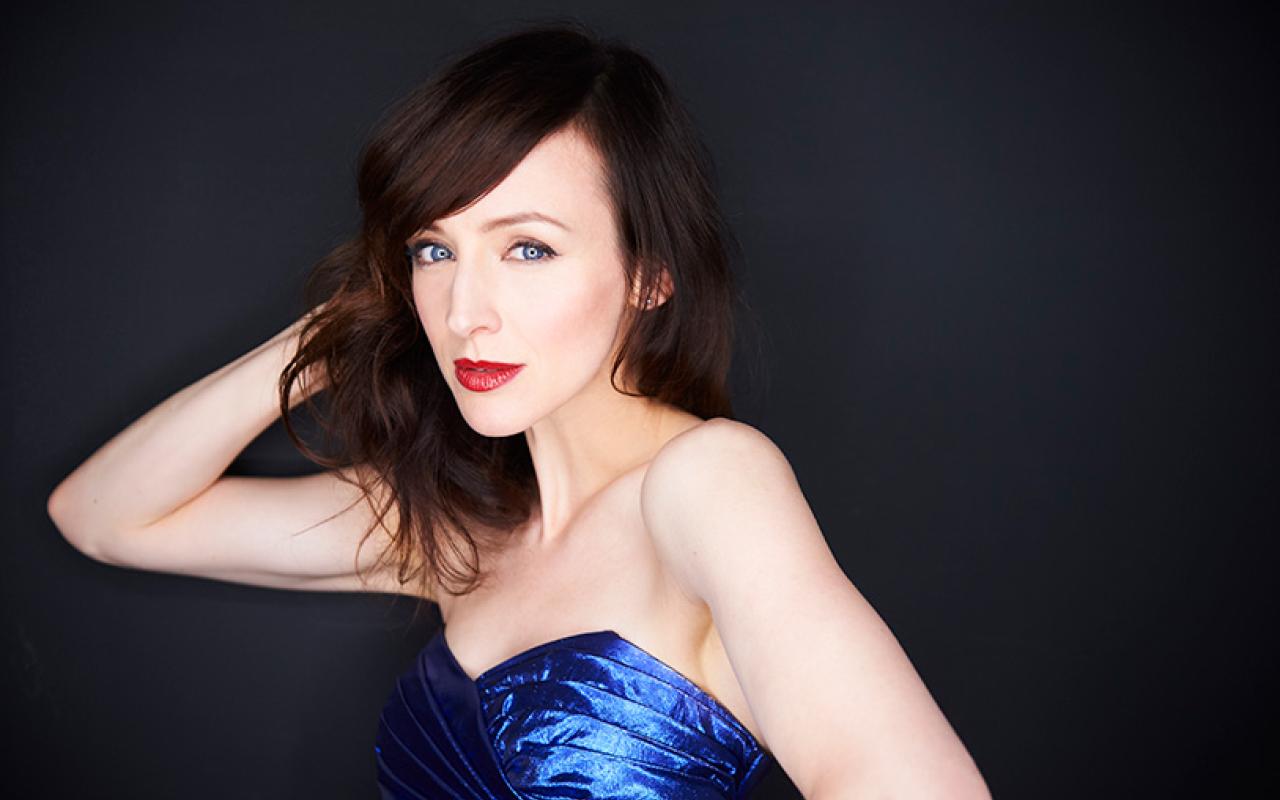 Sarah Slean in a blue gown