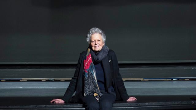 Banff Centre donor sits in an empty Eric Harvie Theatre. 