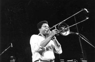 George Lewis pictured performing as part of a faculty concert for the Banff Jazz Workshop on July 25, 1986, in our Max Bell Auditorium.