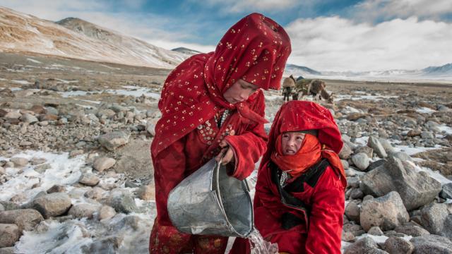 2 Afghan Krygyz women collecting water © Beth Wald