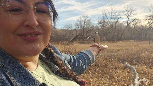 Photo of Indigenous woman out on the land