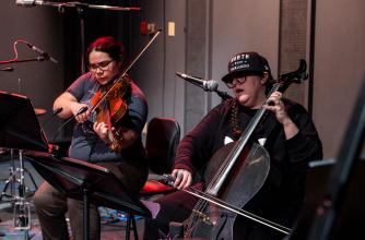Melody McKiver, violist/percussionist/composer; Cris Derksen, composer/cellist,  Canadian Indigenous Classical Music Gathering, 2019. Photo by Jessica Wittman.