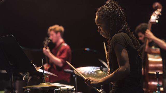 3 Jazz musicians play on stage at Banff Centre, Banff National Park, AB.