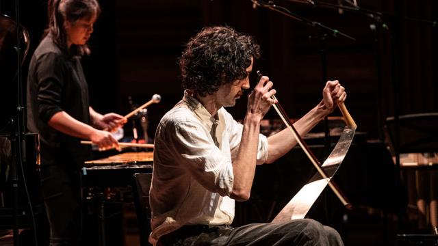 Hoi Tong Keung, percussion; Ollie Hawker, musical saw. Photo by Rita Taylor, Banff Centre 2022. 