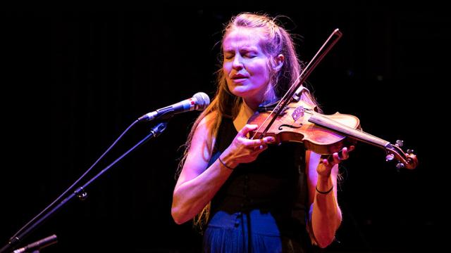 Hannah Epperson sings and plays violin during a concert at Banff Musicians In Residence 2023