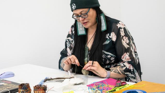 An artist works in studio