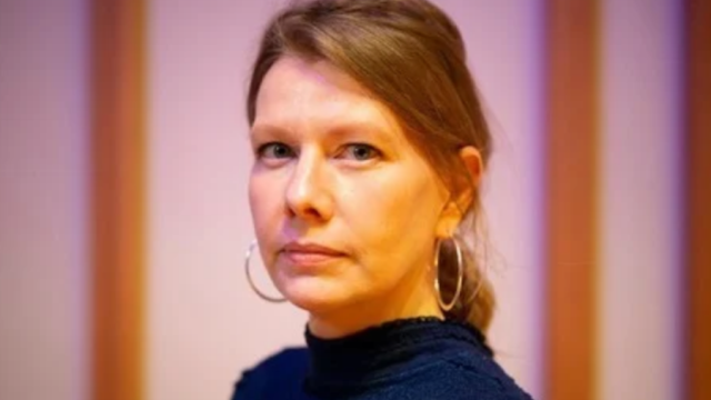 portrait of women with a soft pink background