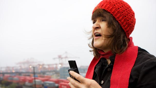 Image of person wearing red hat and scarf