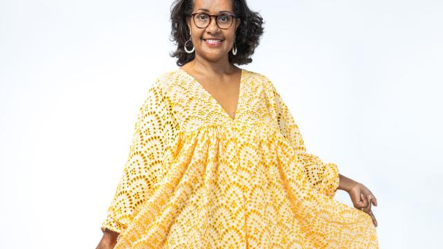 Photo of woman in handmade yellow dress