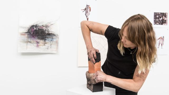 Auður Ómarsdóttir working with clay in the studio