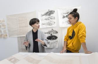 Curator Nicole Burisch in studio visit with Alexa Hatanaka during Craft as Contemporary Art program. Photo by: Don Lee. 