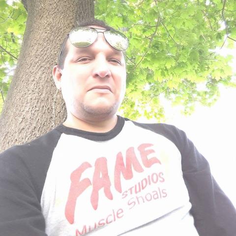 Headshot of Jason Manitowabi
