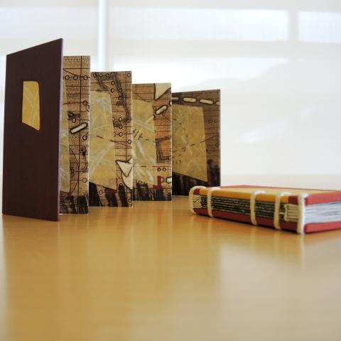 Image of two artists' books by Bonnie Stahlecker, Four Pasages and Land Marks