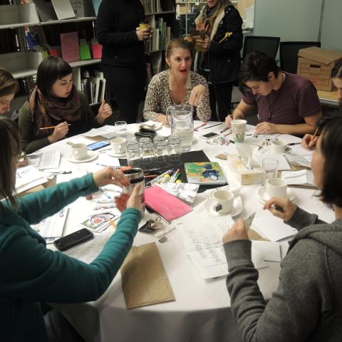 Participants work on creating their own decks