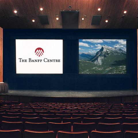 A stage view of a empty Eric Harvie Theatre