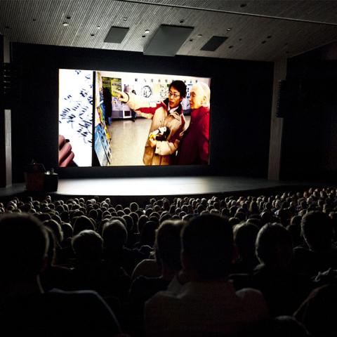 A film screening in Eric Harvie Theatre. 